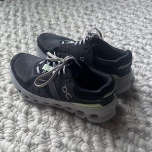 On Running Black and White Athletic Shoes